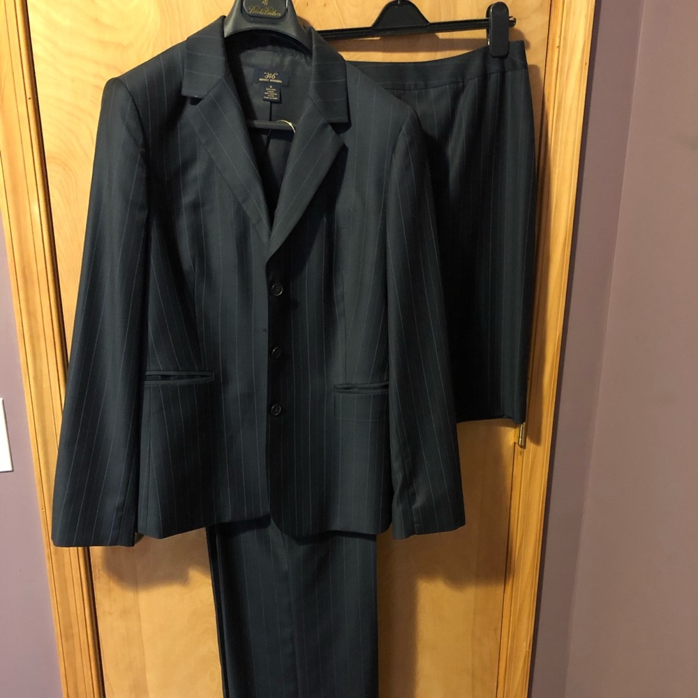 Brooks Brothers navy pinstriped wool suit.